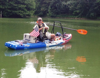 Joey on a Jackson Kayak Big Rig.