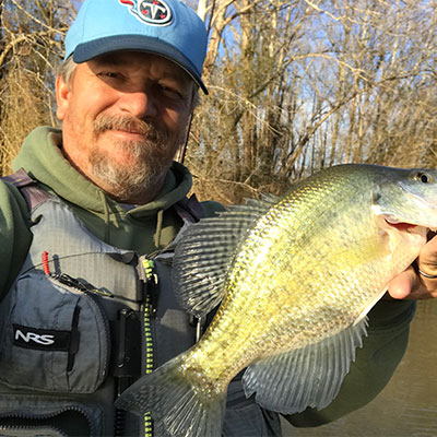 Mike holding a crappie.